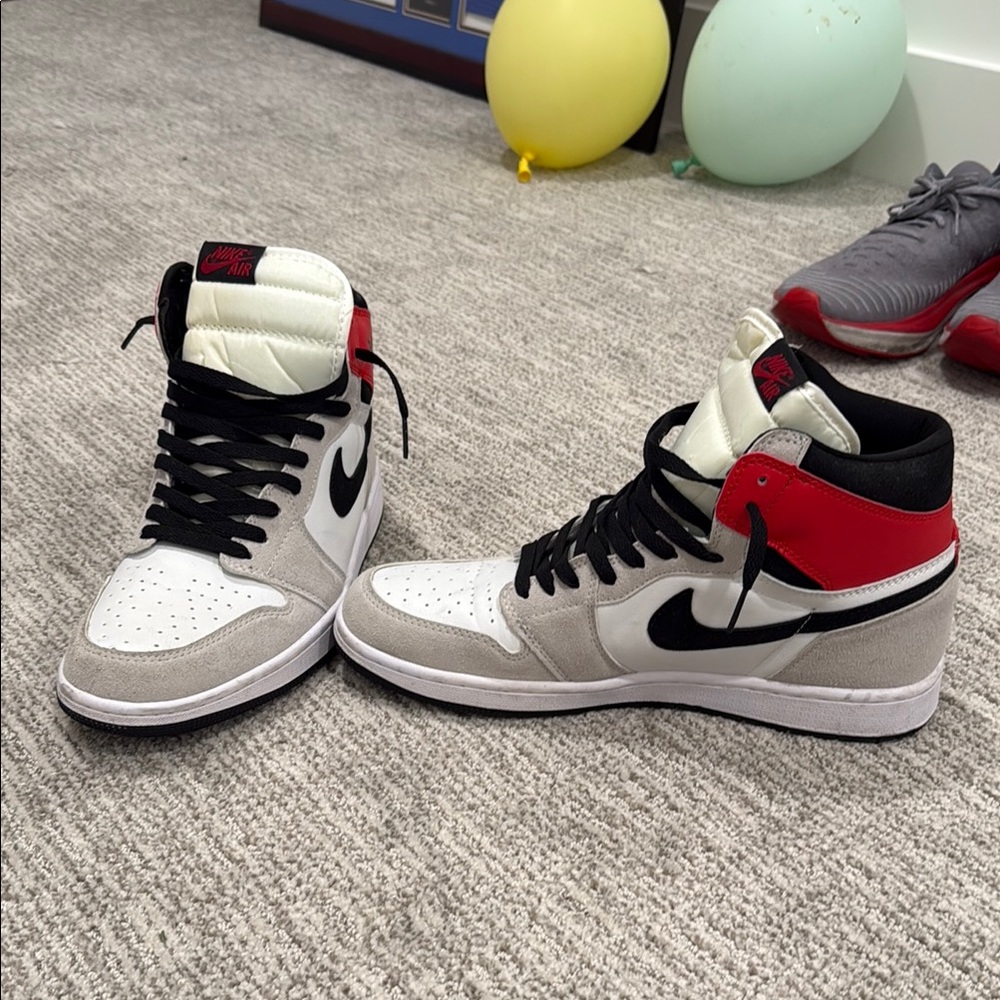Jordan 1 Mid Men's Black and Red High-Top Sneakers